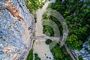 Old Kokkori - Noutsou arched stone bridge on Vikos canyon, Zagorochoria, Greece.