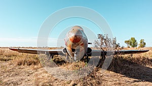 Old L-29 military plane on airbase with blue sky