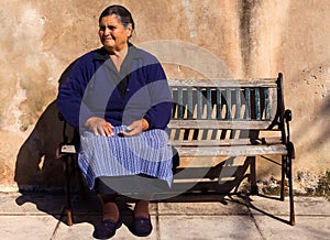 Old lady in a Greek village photo