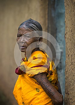 Old Lady outside his house in morning light near Jagdalpur,Chattisgarh,India