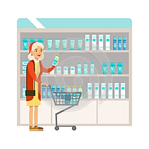 Old Lady In Pharmacy Choosing And Buying Drugs And Cosmetics, Part Of Set Of Drugstore Scenes With Pharmacists