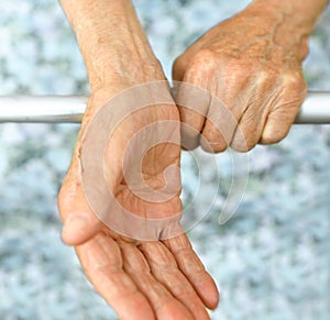 Old lady`s hand with open palm. Elderly lady is waiting for help. Senior lady in retirement nursing home. Elderly, Aging