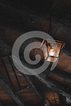 Old lamp hanging from the ceiling