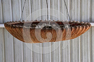 An old lamp hanger in a room of a building