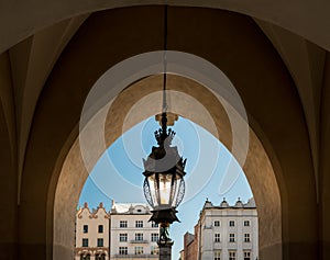 Old lamp and Krakow architecture. Poland, Europe. photo