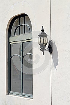 Old lamp lantern and window photo