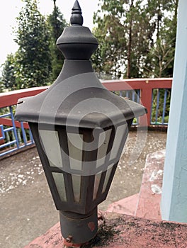 Old Lamp Post in a path.