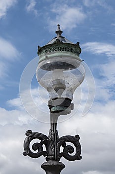 Old lamppost in a street of copenague photo