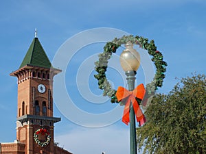 An Old Lamppost, Wreath and Town Clock Tower