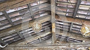 Old lamps under a wooden roof