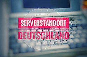 Old laptop with the inscription Serverstandort Deutschland in English Server Location Germany to symbolize the use of a German hos