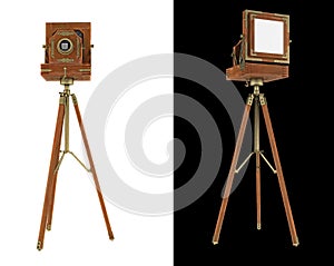 Old large format camera on tripod isolated