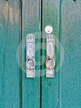 Old Latches on Turquoise Doors