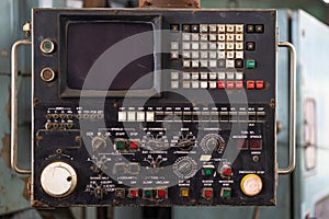 Old lathe machine manual control panel with many button switch for metal CNC production data