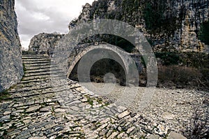 Old Lazaridi - Kontodimou arched stone bridge on Vikos canyon, Zagorohoria, Greece.