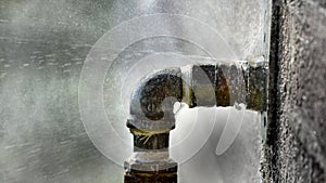 Old Leaky Pipes Squirting Water from Big Leak photo