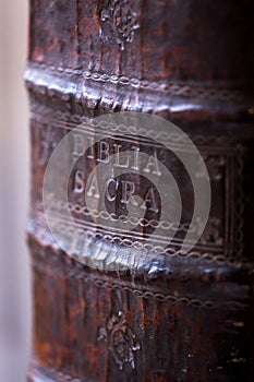 Old leather book spine. Holy bible closeup spine detail