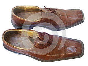 Old leather brown shoes, isolated