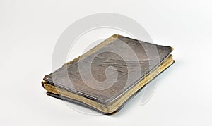 Old leather cover book on white background.