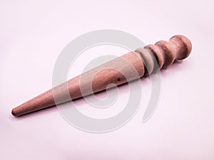 old Leather crafting tool - round wooden Multi-Size Edge Slicker and Burnisher isolated on white background