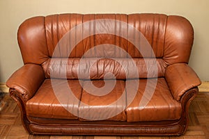 old leather sofa in an old room