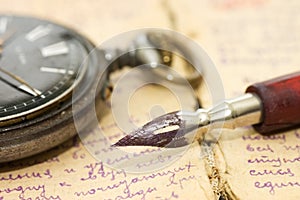 Old letters and pen as a background