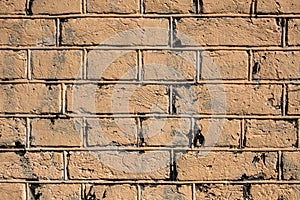 Old light beige brick wall. rough surface texture