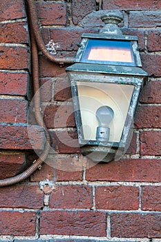 Old light on a brick wall