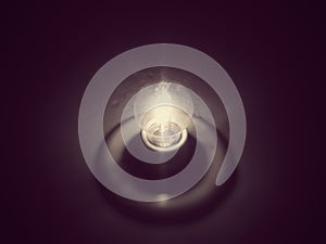 Old light bulb on dark background, Illuminating the darkness photo