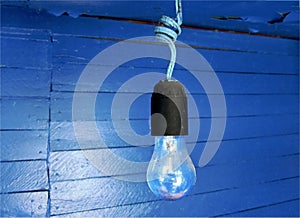 Old light bulb on a twisted wire