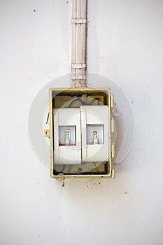 Old light switch in the Off Position on dirty and old wall