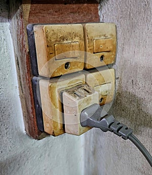 Old light switch and plug socket