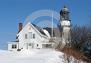 Old Lighthouse Buried in Snow