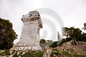 The old lighthouse overlooking the church of St. Euphemia