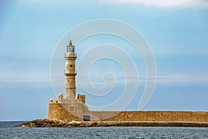 Old lighthouse in port of Chania on Crete island. Greece