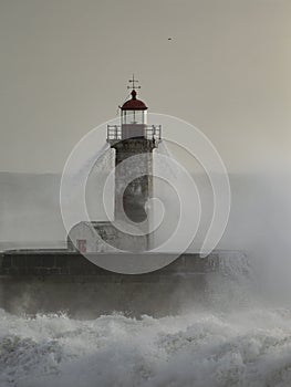 Old lighthouse during storm