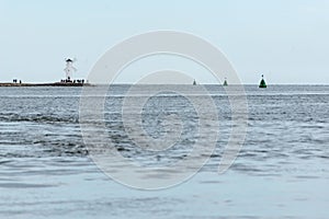 Old lighthouse in Swinoujscie, a port in Poland on the Baltic Sea. The lighthouse was designed as a traditional windmill.