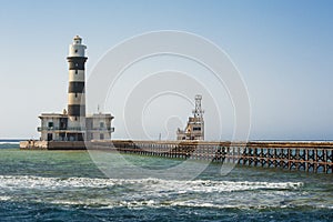 Old lighthouse on a tropical reef