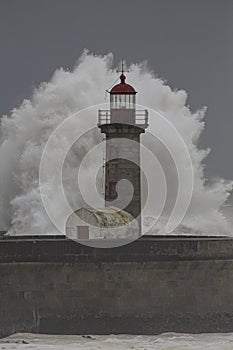 Old lighthouse under heavy storm