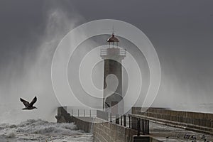 Old lighthouse under heavy storm