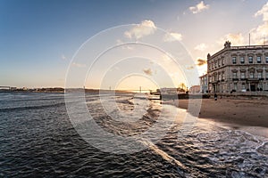 Old Lisbon Portugal panorama. cityscape with roofs. Tagus river.