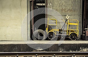 Old Little speeder gang cars or Railway bogie trolley yellow.