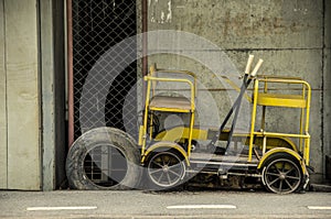 Old Little speeder gang cars or Railway bogie trolley yellow. photo