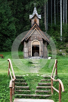 Old little wooden church in the forest