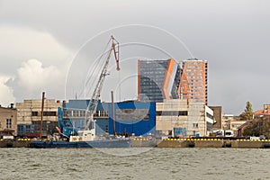 Old loading ship with jib crane near the Klaipeda Sea Port, Lithuania.