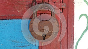 Old lock on a color door