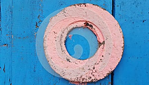 IRON CIRCLE ON THE BLUE WALL