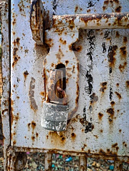Old lock on the door in very bad condition