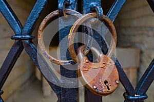 old lock on medieval metal door