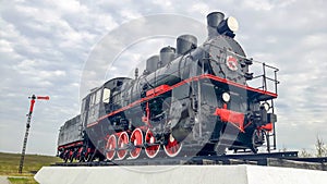 Old locomotive as memorial at dead track in Salekhard